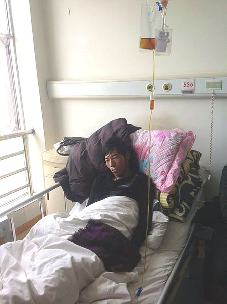 Mr Tsering Gyaltsen Beaten 9/29/13 For Refusing To Fly China's Flag